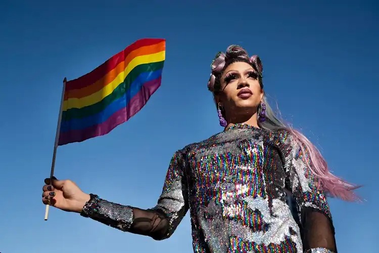 Close-up pride portrait with warm lighting