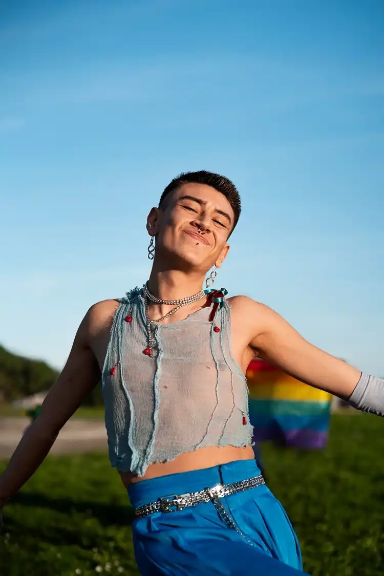 People celebrating together outdoors at a pride gathering