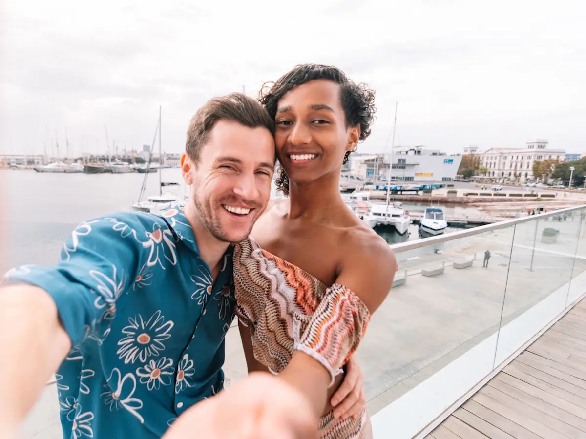 Happy trans couple enjoying a moment together outdoors
