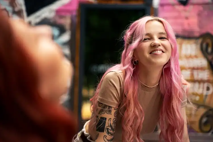 Friends smiling outdoors