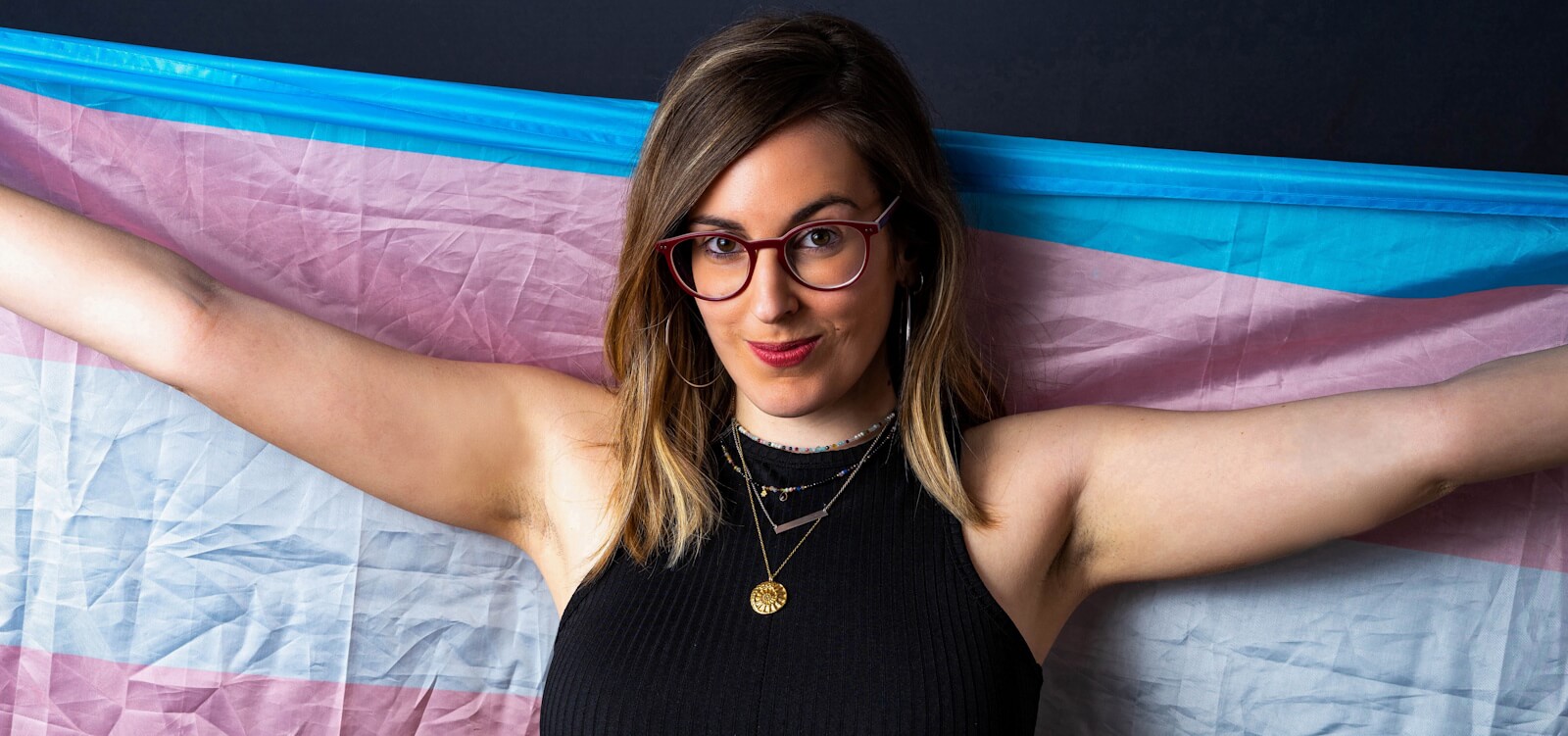 Trans woman and man enjoying a friendly date together at a café